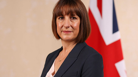 Image of the Chancellor, Rachel Reeves, a woman with short brown hair with a straight fringe wearing a dark suit jacket. 