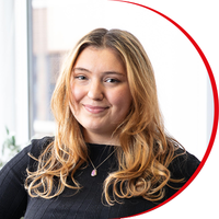 Headshot: Grace Goodier, a young woman with long fair hair wearing a black top.