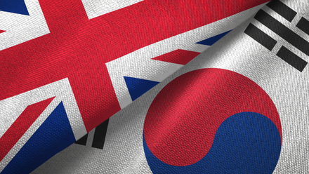 Image of a Union Jack and South Korean flag next to each other.